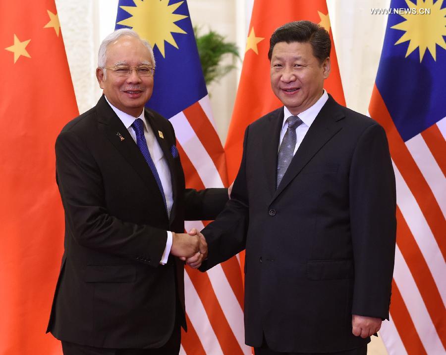 الصين وماليزيا تعززان التعاون الثنائي