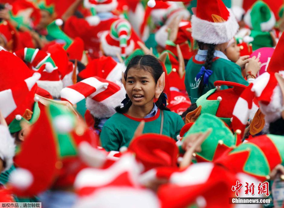 تسجيل 1762 طفل تايلاندي متنكرين "أقزام" عيد الميلاد رقما قياسيا عالميا
