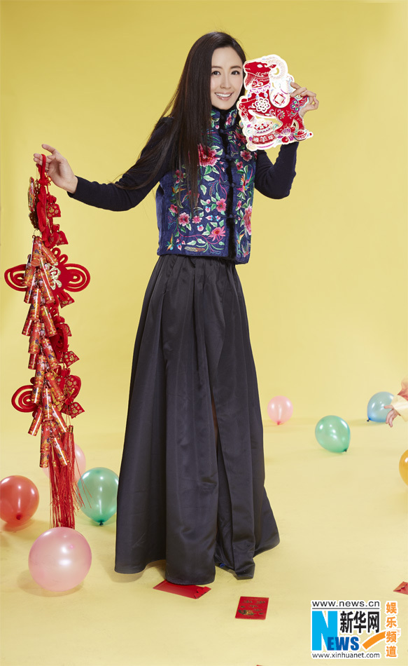 يانغ تونغ شو تلتقط صورا مع ابنها في مناسبة عيد الربيع