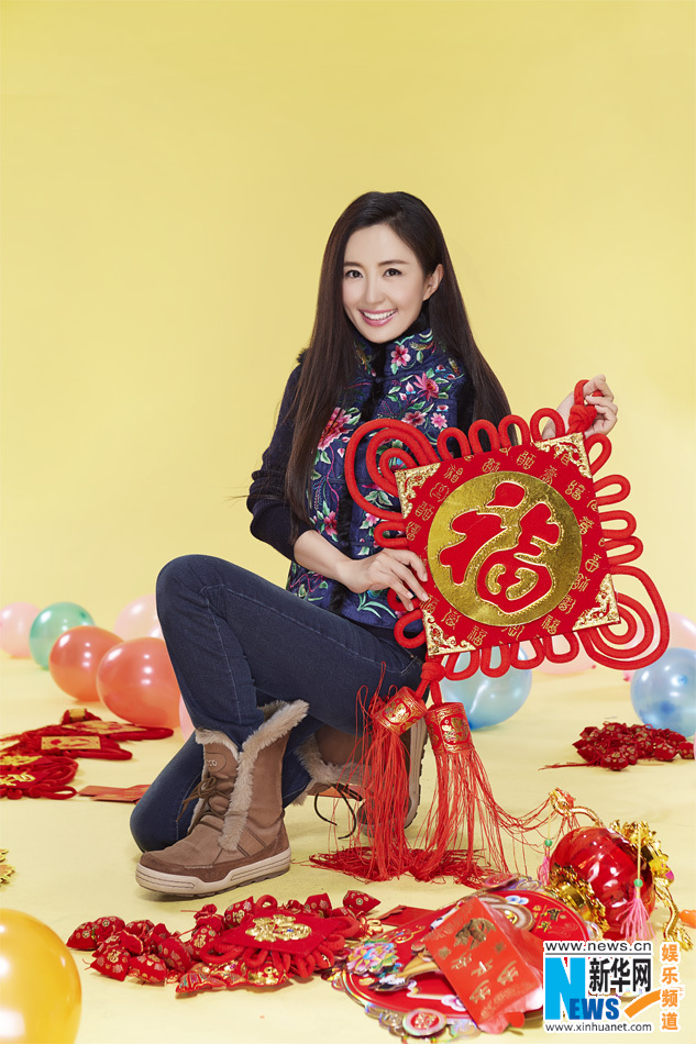 يانغ تونغ شو تلتقط صورا مع ابنها في مناسبة عيد الربيع