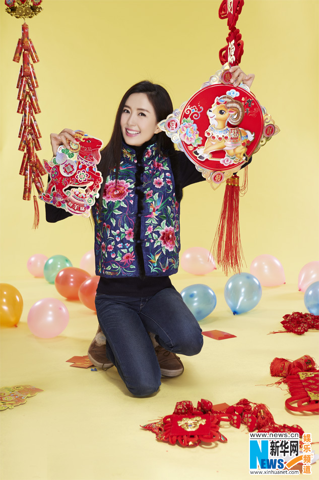 يانغ تونغ شو تلتقط صورا مع ابنها في مناسبة عيد الربيع