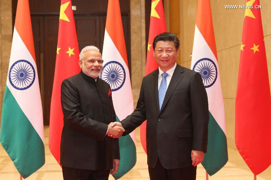 الرئيس الصيني يلتقى برئيس وزراء الهند