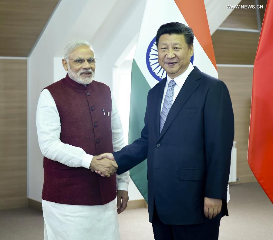 الرئيس الصيني يجتمع مع رئيس الوزراء الهندي