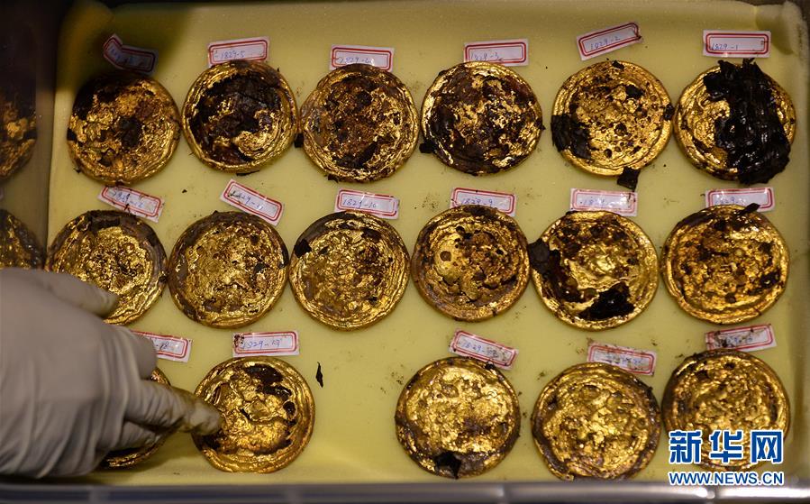 علماء الآثار يكتشفون 285 قرصا ذهبيا في  المقبرة الكبرى لأسرة هان الغربية