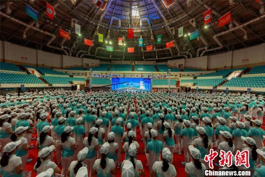 هانغتشو: متطوعون يؤدين اليمين لخدمة قمة العشرين