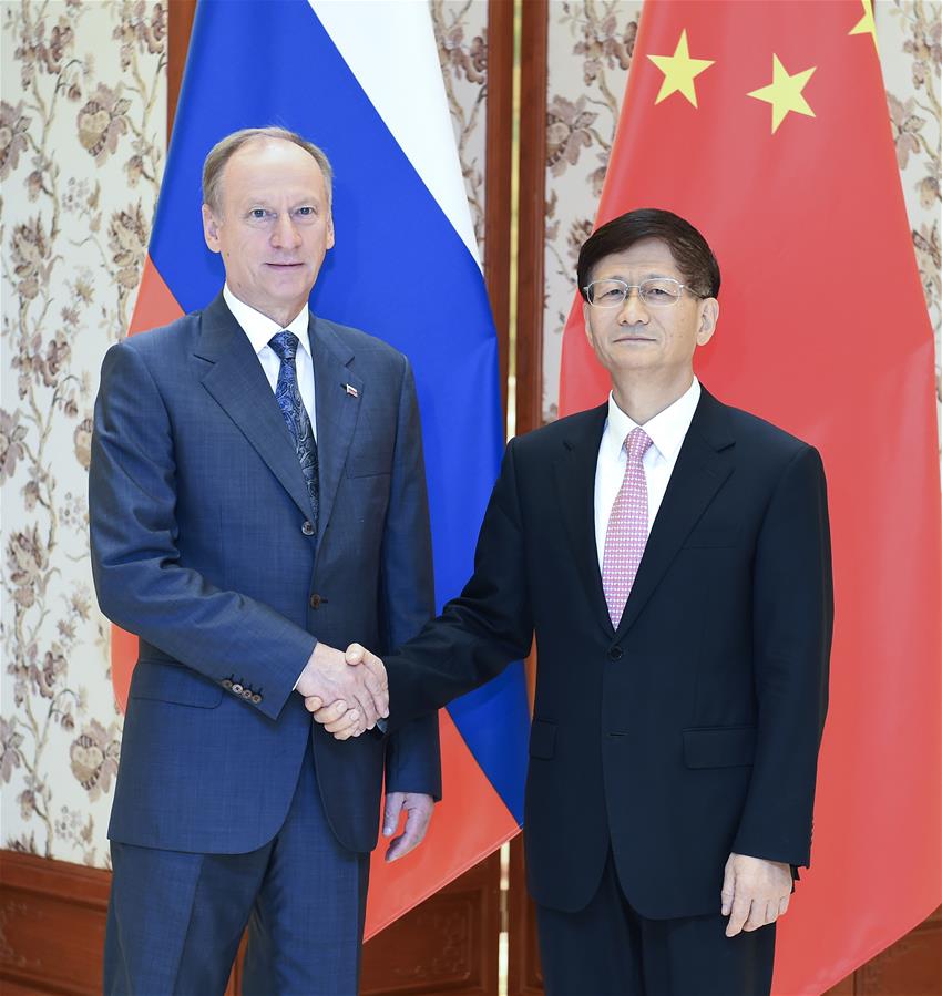 الصين وروسيا تتعهدان بإقامة تعاون أمنى أوثق