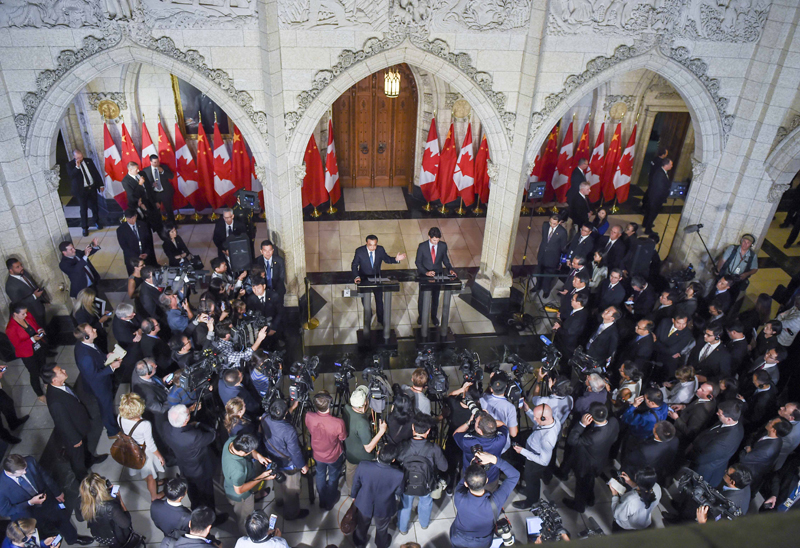 الصين وكندا تبدآن محادثات استكشافية بشأن اتفاقية تجارة حرة