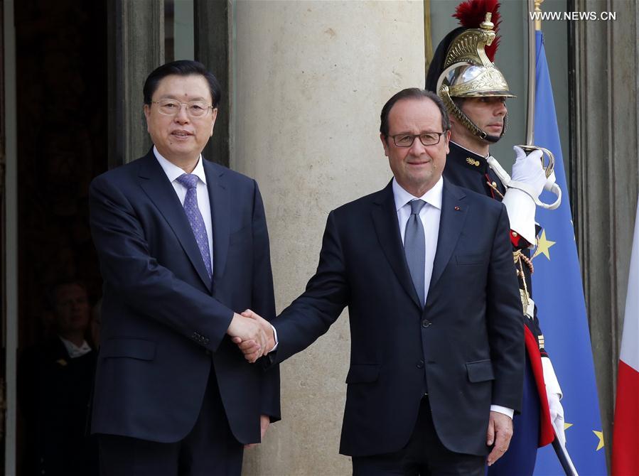 قادة من الصين وفرنسا يتعهدون بدعم العلاقات والتعاون