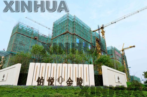 مدينة قوانغتشو تقيد شراء منازل لتهدئة سوق العقارات
