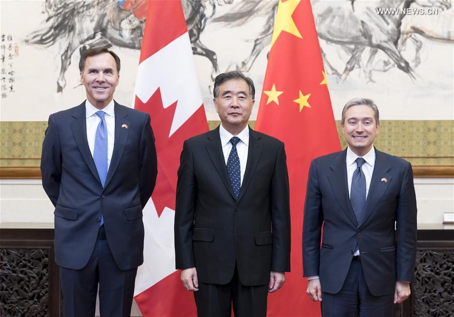 الصين وكندا تطلقان حوارا استراتيجيا اقتصاديا وماليا في بكين