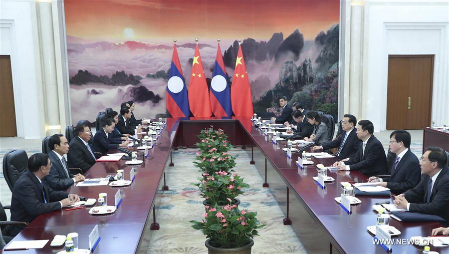 رئيس مجلس الدولة الصيني يلتقي رئيس لاوس لبحث التعاون