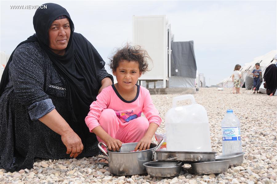 مقالة :النازحون من غرب الموصل يشعرون بالامن رغم الصعوبات القاسية