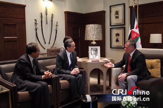 العاهل الأردني يلتقي وزير الخارجية الصيني