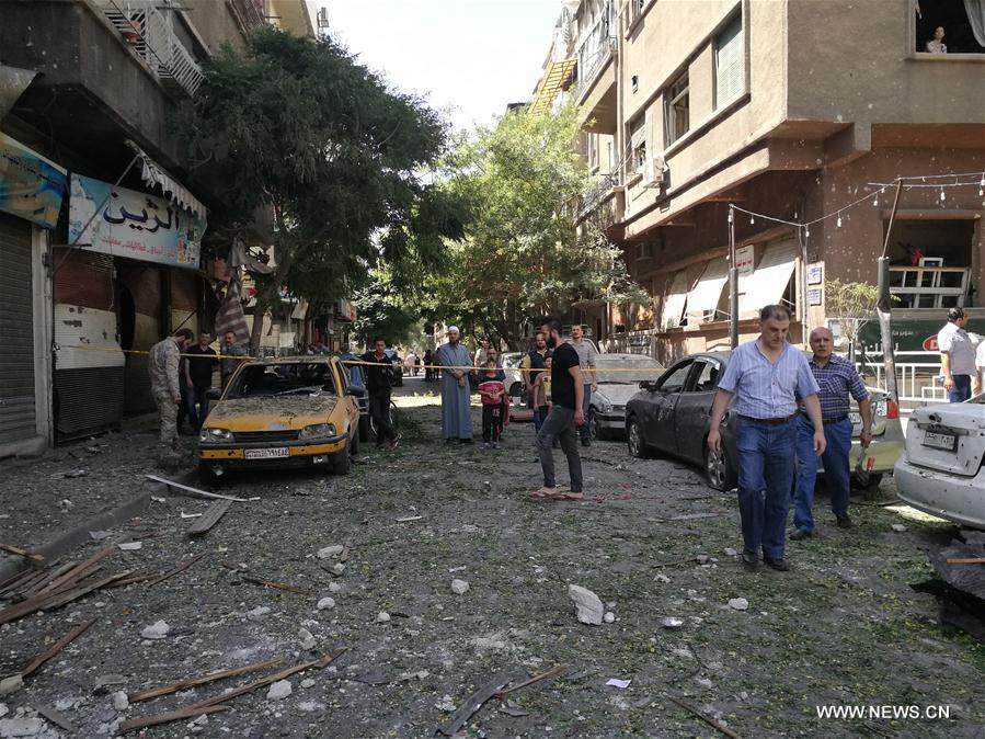 تقرير إخباري : 20 قتيلا على الأقل في هجوم انتحاري في دمشق