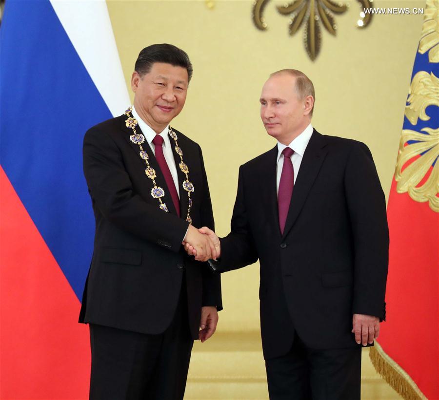 الصين وروسيا تتعهدان بالقيام بدور حجر التوازن فى السلم العالمى