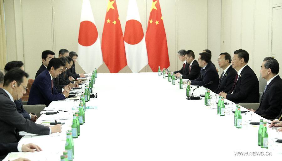 الرئيس الصيني يلتقي برئيس الوزراء الياباني ويحث اليابان على التخلص من الاضطرابات فى العلاقات الثنائية