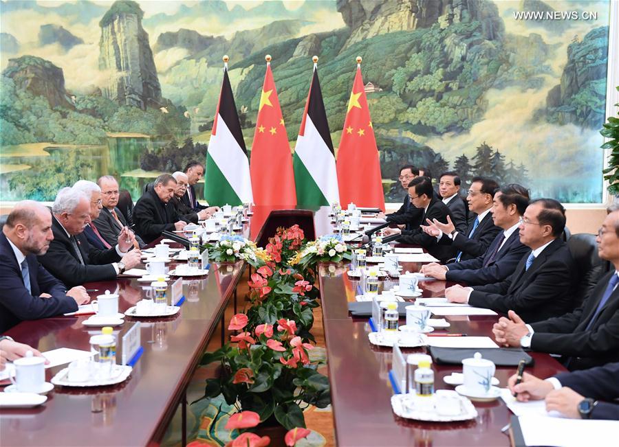 الصين تعزز التعاون مع فلسطين فى مجالات التجارة والبنية الأساسية