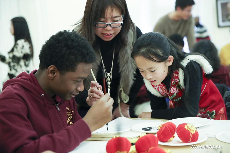 تقرير: حدث ثقافى يجمع طلابا صينيين وأمريكيين قبل احتفالات العام القمري الجديد