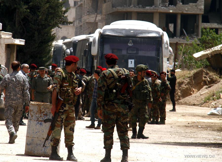 إجلاء دفعة ثانية من مقاتلي المعارضة من ثلاث بلدات في جنوب دمشق
