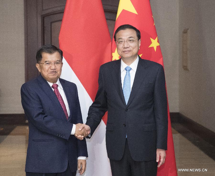 رئيس مجلس الدولة الصيني يؤكد التزام الصين بالتجارة الحرة