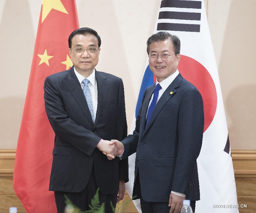 الصين وكوريا الجنوبية تتفقان على تعزيز الثقة المتبادلة والتعاون