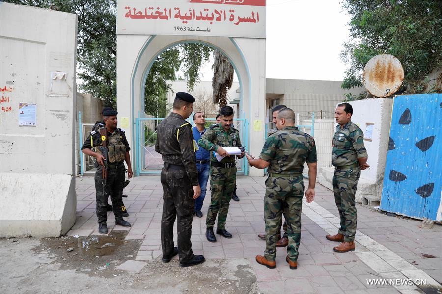 القوات الأمنية العراقية تشدد من إجراءاتها الأمنية قبيل انطلاق الانتخابات