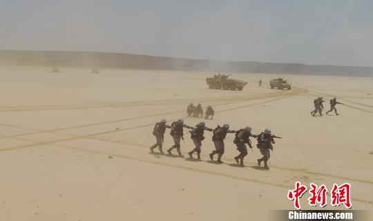 بالصور: تدريب بالذخيرة الحية لقوات قاعدة الدعم الصينية في جيبوتي