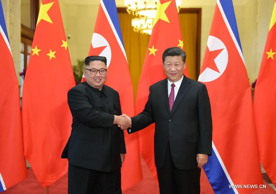 مقالة : شي جين بينغ وكيم جونغ أون يعقدان محادثات في بكين