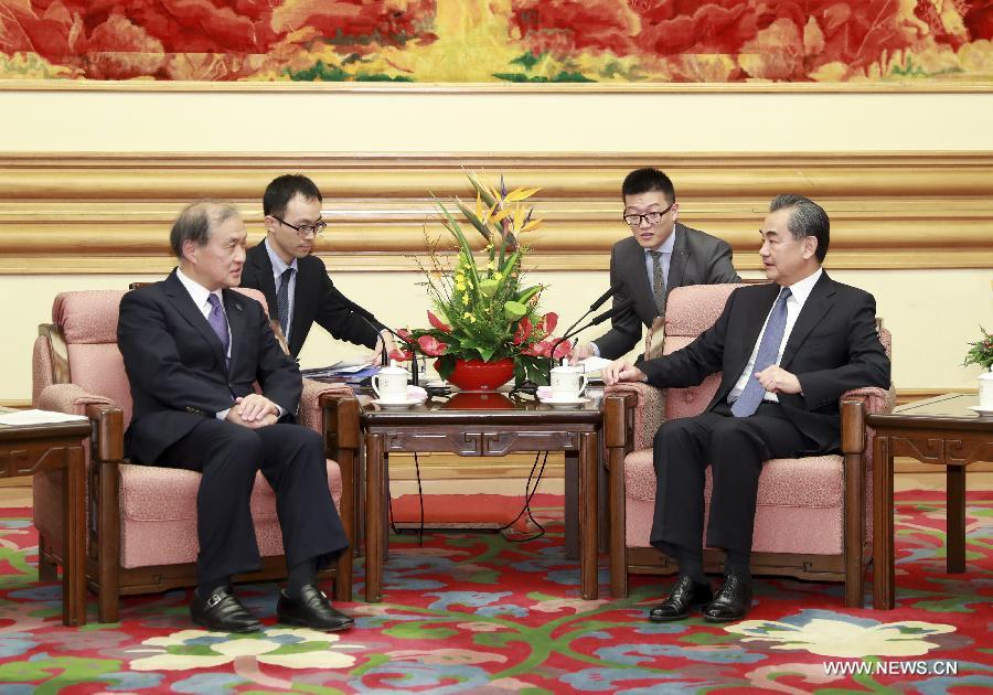 عضو مجلس الدولة الصيني يجتمع مع مسئول ياباني