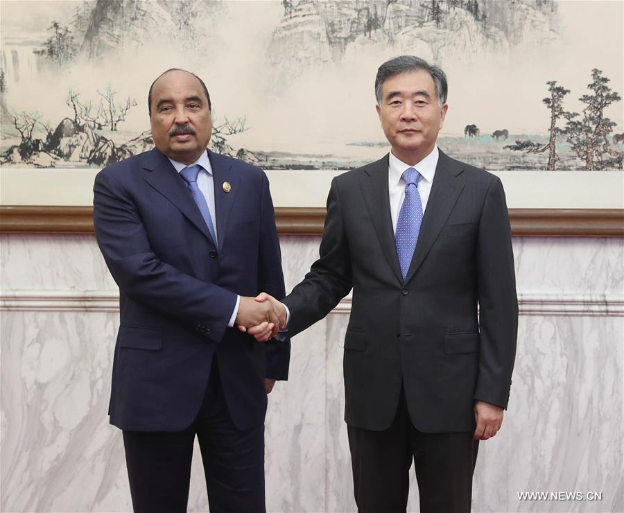 كبير المستشارين السياسيين الصينيين يلتقي رئيس موريتانيا
