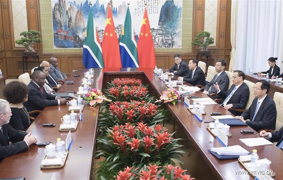 رئيس مجلس الدولة الصيني يلتقي رئيس جنوب أفريقيا