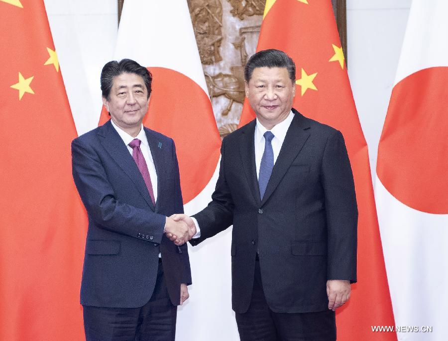 مقالة : شي يجتمع مع رئيس الوزراء الياباني ويحث على الاعتزاز بقوة الدفع الايجابية في العلاقات الثنائية