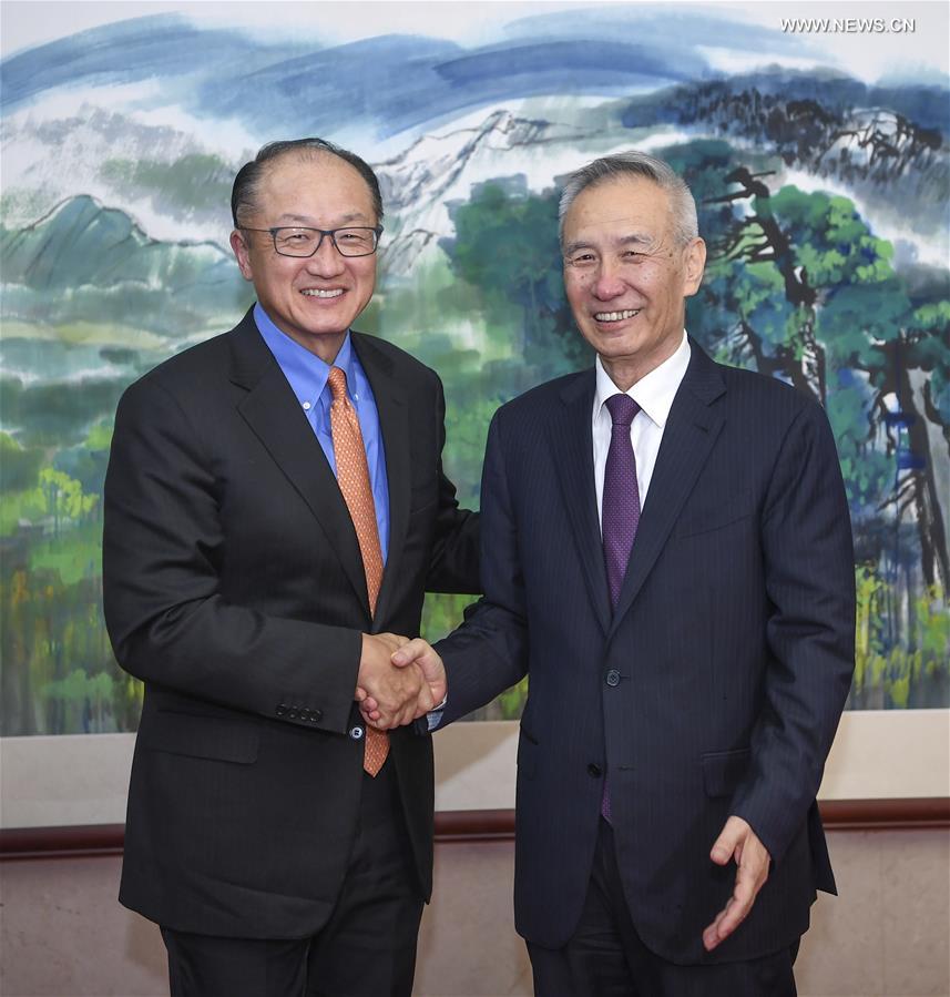 نائب رئيس مجلس الدولة الصيني يلتقي برئيس البنك الدولي