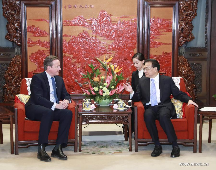 رئيس مجلس الدولة الصيني يلتقي رئيس الوزراء البريطاني السابق
