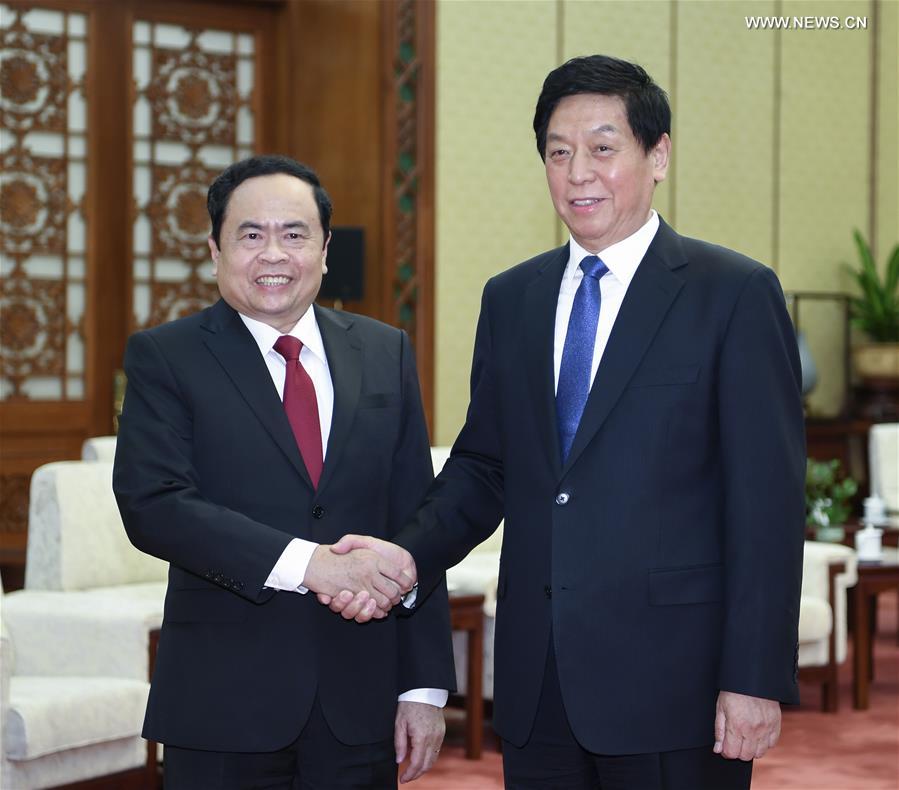زعيمان صينيان يلتقيان برئيس جبهة أرض الآباء الفيتنامية