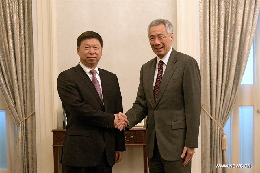 الصين وسنغافورة مستعدتان لمزيد من تقوية العلاقات بين الحزبين