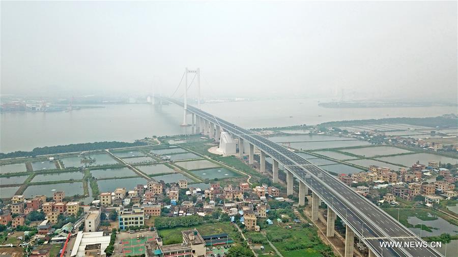 افتتاح جسر جديد لتعزيز النقل في منطقة الخليج بجنوب الصين