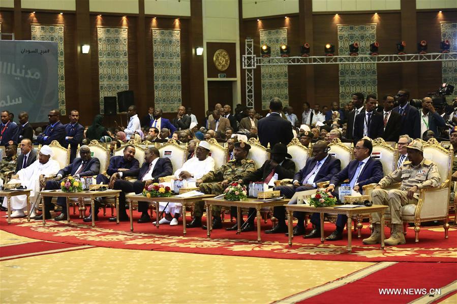 تقرير إخباري : توقيع وثائق الفترة الانتقالية في السودان