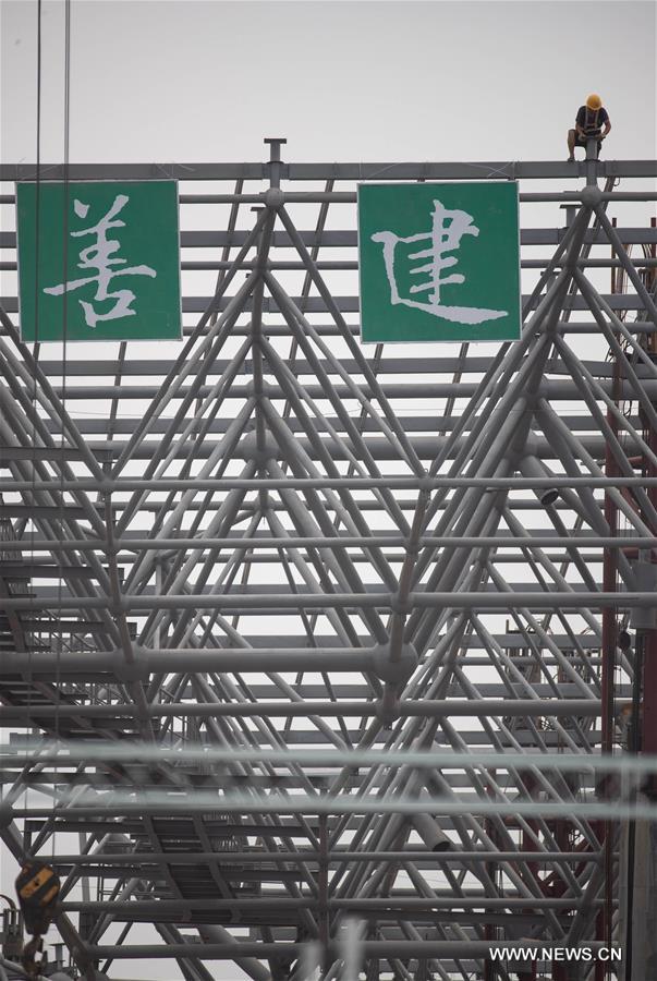 اكتمال بناء الهيكل الرئيسي لمحطة مطار دولي جديد في مدينة جنوب غربي الصين