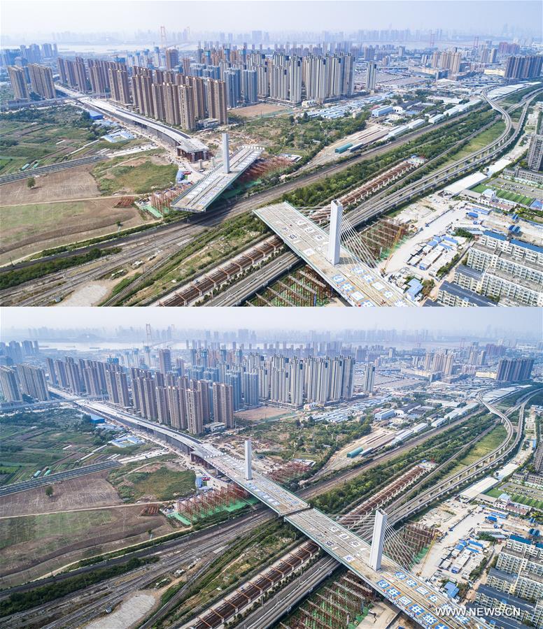 تثبيت جسر ضخم وزنه 36 ألف طن ليعبر فوق 11 خط سكك حديدية في وسط الصين