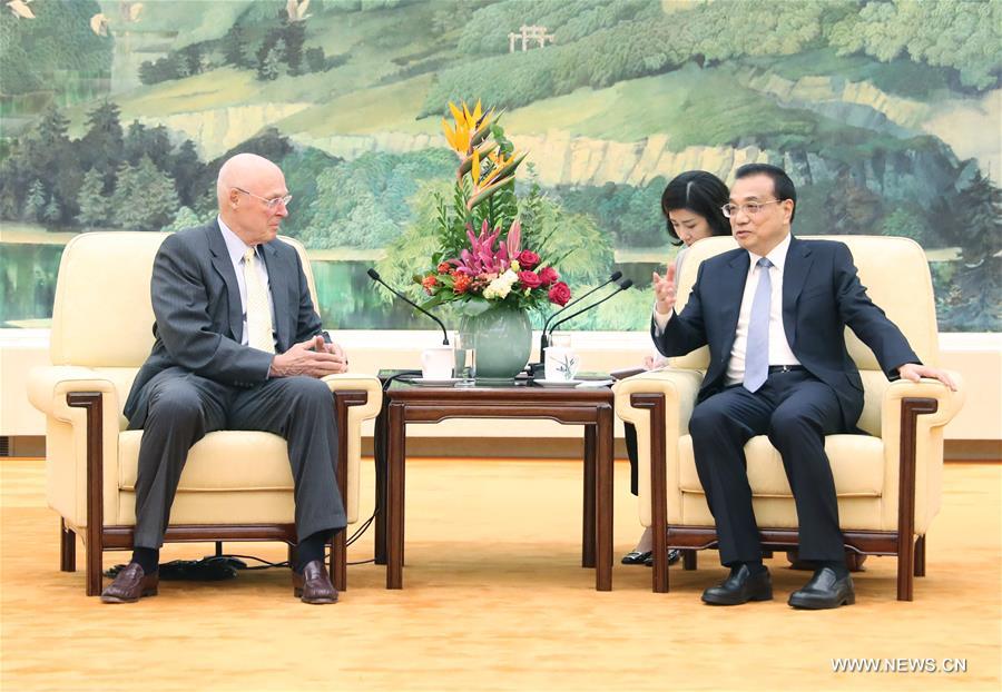 رئيس مجلس الدولة الصيني يلتقي وزير الخزانة الأمريكي السابق