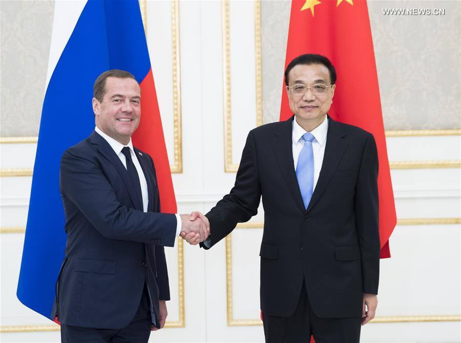رئيس مجلس الدولة الصيني يبحث مع نظيره الروسي أوجه التعاون المختلفة