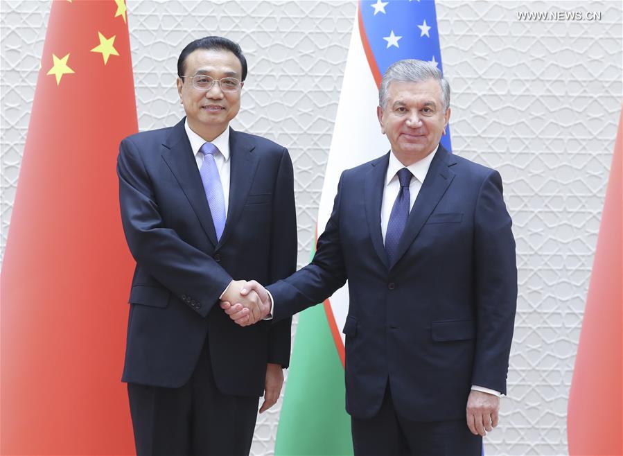 تقرير إخباري: رئيس مجلس الدولة الصيني: الانفتاح ثنائي الاتجاه يخلق فرصا تنموية أكبر للصين وأوزبكستان