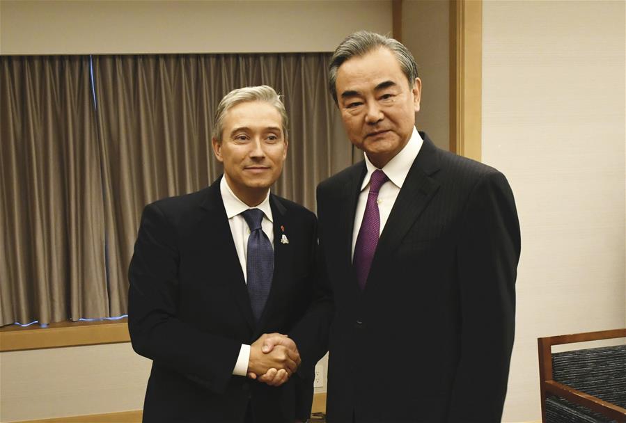 تقرير إخباري: وزير الخارجية الصيني يلتقي نظراءه من كندا وهولندا وتشيلي لبحث العلاقات الثنائية