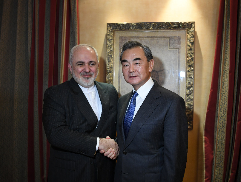 وزيرا الخارجية الصيني والإيراني يناقشان مكافحة تفشي فيروس كورونا الجديد