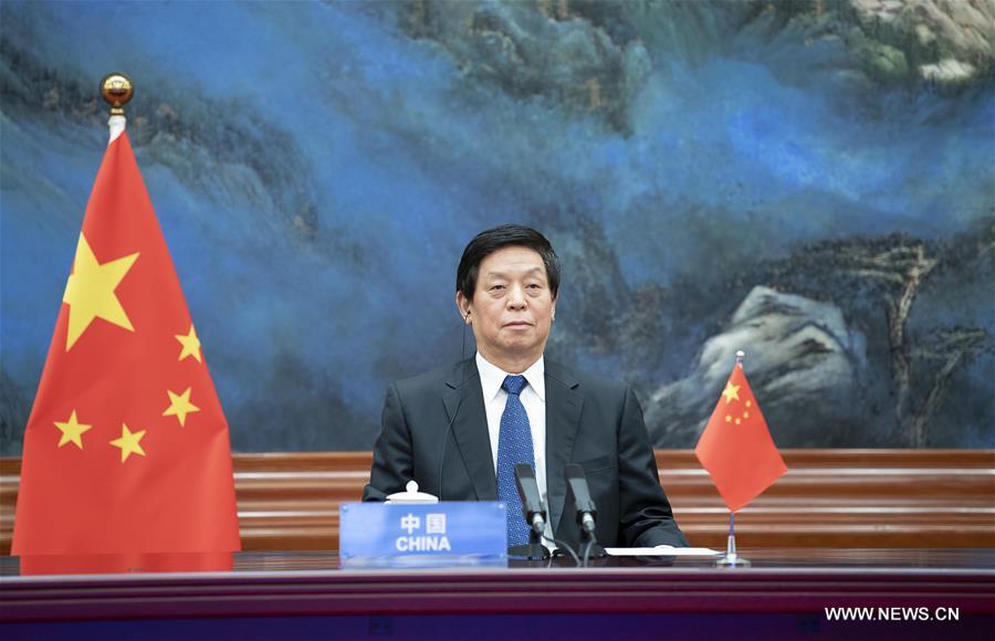 تقرير إخباري: كبير المشرعين الصينيين يدعو إلى حماية التعددية