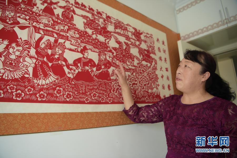 الورق المقصوص.. ثلاثة أجيال تحفظ الفن الصيني التقليدي