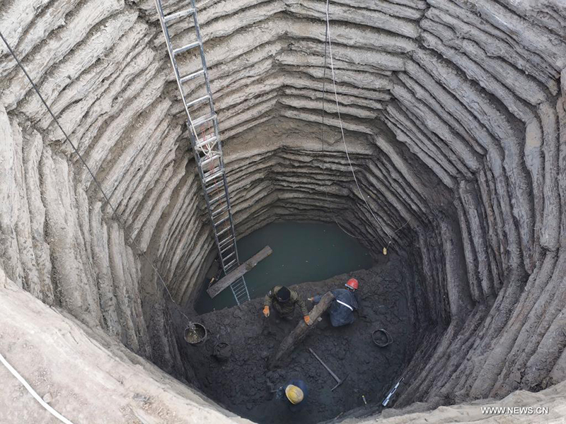 اكتشاف بئر ذو هيكل خشبي قبل ألفي سنة في شمالي الصين