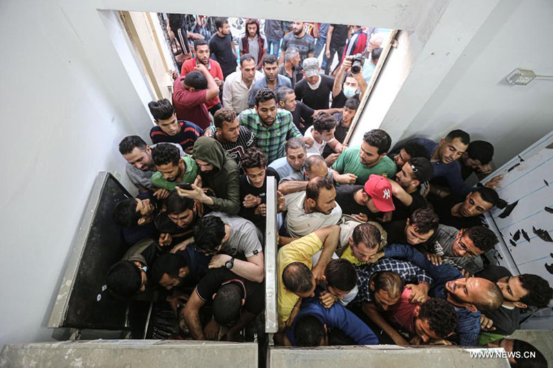 تقرير إخباري: 20 قتيلا في تصعيد بين الفلسطينيين وإسرائيل في غزة على خلفية توتر متواصل بالقدس