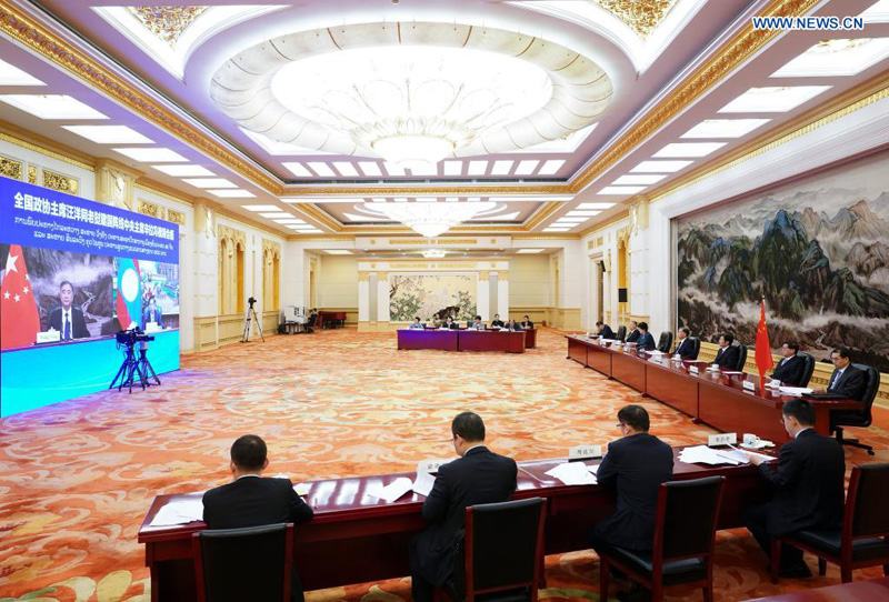 كبير المستشارين السياسيين الصينيين يتعهد بتعزيز العلاقات بين الصين ولاوس